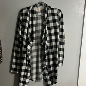Plaid light jacket/T shirt material. Soft.